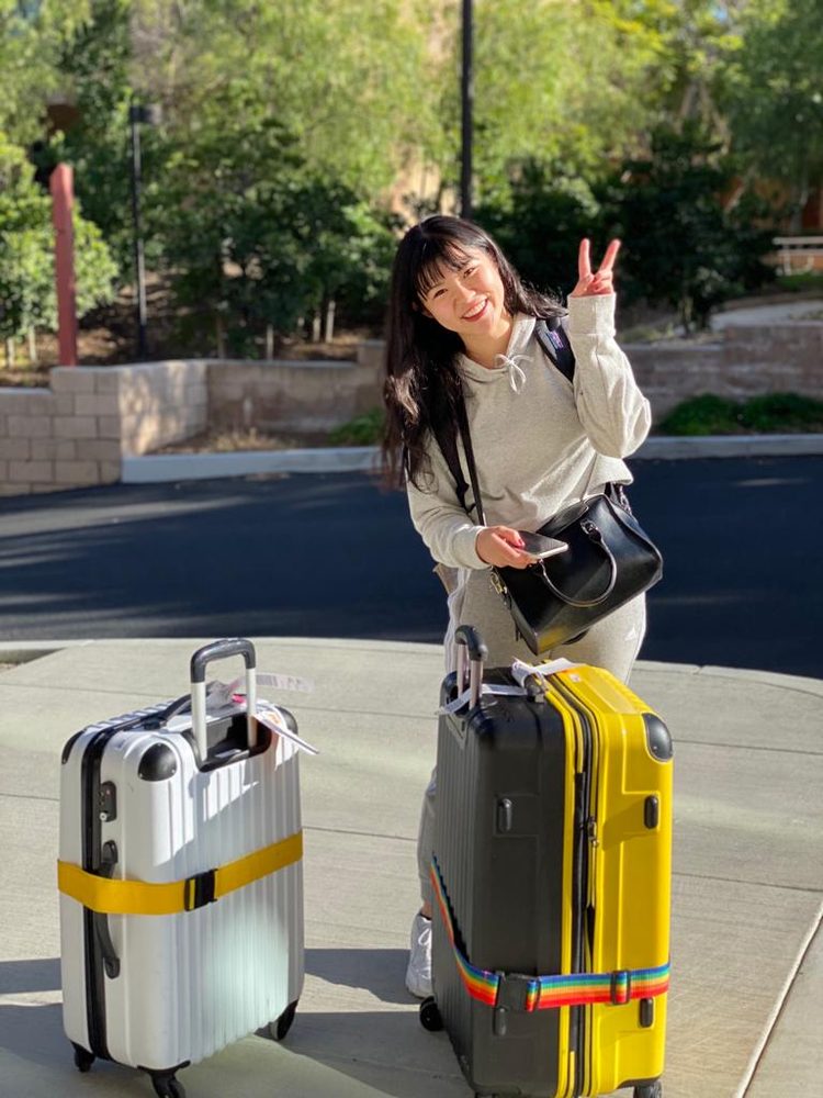 Student arriving with luggage